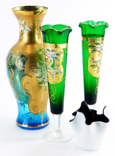 An ATC Murano Venetian glass handkerchief vase, in black and white, and three items of Venetian coloured glass, each with enamel decoration of flowers.