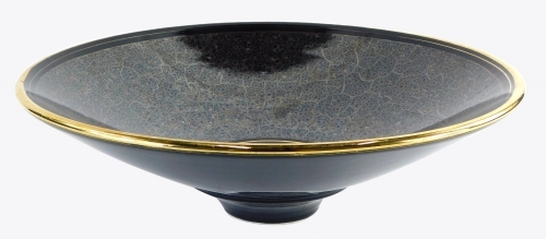 A studio ceramic shallow bowl, with bronzed and gilt decoration, signed indistinctly to underside, Sallis, 41cm diameter.