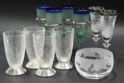 A collection of glass, to include four Nick Munns pewter and crackle glass vases, four Pelly Ploviez goblets, etc.