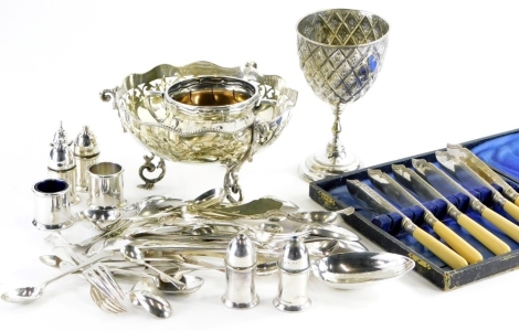 A collection of silver plate, to include a Victorian goblet with Gothic decoration, a pierced centrepiece, cutlery, etc.