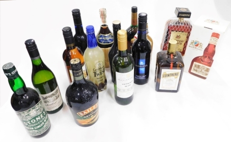 A collection of wine, spirits, etc., to include ginger wine, Cointreau, Grand Marnier, etc.