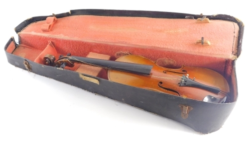 A violin, stamped Stradivarius to the two piece back, length of back 36cm.