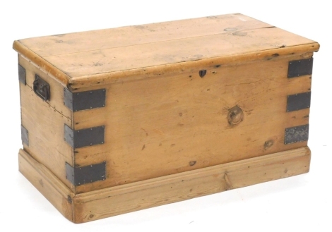 A stripped pine and metal mounted blanket box, 69cm wide.