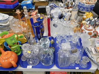 A quantity of glassware, to include moulded glass decanter, jar and cover, flared rim vase, part dressing table set, carnival glass long stem vase, red glass twisted stem vase, etc. (a quantity)