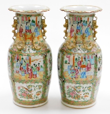 A pair of 19thC Chinese Canton porcelain baluster vases, with gilt kylin handles and applied chilin to the shoulders, decorated with panels of figures at court, birds, flora, and insects, in a famille rose palette, 46cm high. - 8