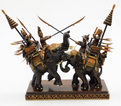 A carved Indian hardwood group of two mounted elephants, two elephants with figures in combat, with wood inlay and gilding, 33cm high, 37cm wide, 15cm deep. - 3