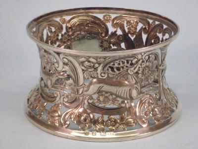 An Edward VII silver dish ring with cast and pierced decoration of stag