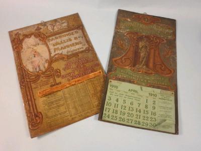 A 1910 printed tin advertising calendar for Barringer