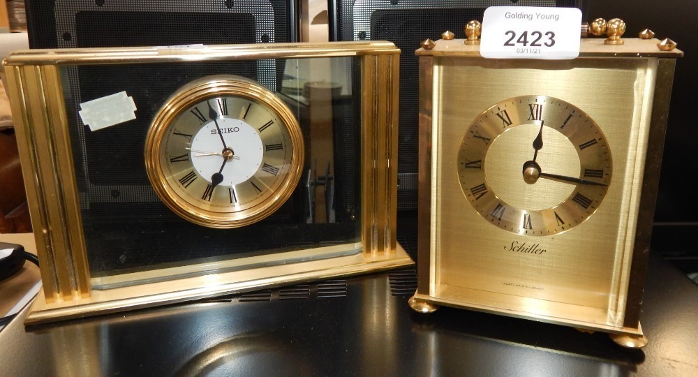 Two mantel clocks to include a Schiller and a Seiko brass and