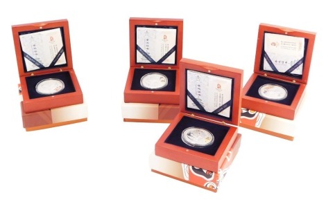 A Royal Mint Beijing 2008 Olympic Games proof coin set, with four silver Beijing 2008 collectors coins, boxed.