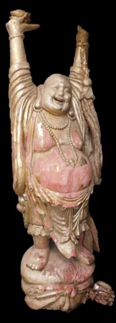 A lifesize gilt wood figure of Buddha, modeled standing with his hands raised, a necklace about his neck, with distended belly, raised on a lotus flower base, 203cm high. (AF)