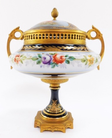 A Sevres late 19thC porcelain and ormolu pot pourri vase and cover, of twin handled baluster form, decorated to the lid with reserves of Cupid, and a sheath of arrows, signed Callot, against a bleu du roi ground, to the vase with a band of flowers, Chatea