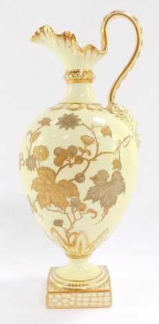 A Derby porcelain yellow ground jug, circa 1886, of moulded, baluster form, painted in gilt and silver with berries and blossom, printed mark, 27cm high.