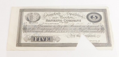 Edwardian Stamford, Spalding and Boston Banking Company £5 note, number M5633, dated 1st February 1907, with triangular cancellation out.