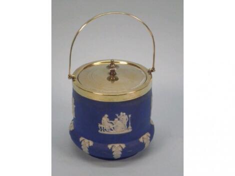 A Wedgwood Jasperware biscuit barrel with a silver plated mount and swing handle