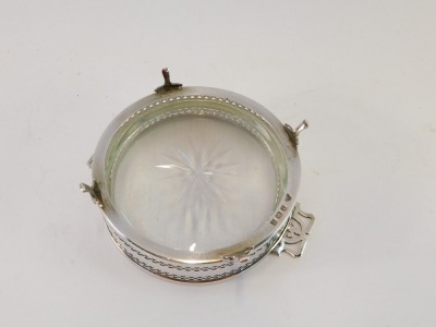 A George V silver and cut glass sweet dish, of twin handled circular form, raised on four fleur-de-lis feet, Birmingham 1925, 1½oz of weighable silver. - 3