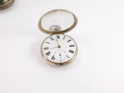 A Victorian silver pair cased pocket watch by James Dann of Wisbech, open faced, key wind, enamel dial bearing Roman numerals, subsidiary seconds dial, movement number 3924, the case of plain form, London 1871, 141g all in. - 2