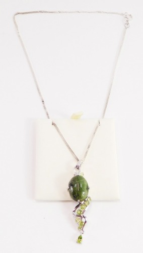 A Shipton & Co green opal pendant, in silver mount on silver chain, boxed.