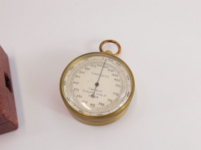 A T Wheeler of London early 20thC brass cased compensated barometer, in a fitted case, the dial 5cm wide. - 2