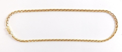 A double S link neck chain, on a snap clasp marked 9kt, 41cm long.