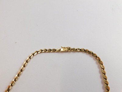 A double S link neck chain, on a snap clasp marked 9kt, 41cm long. - 3