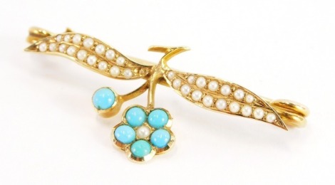 An Edwardian style bar brooch, with floral panel set with seed pearls, and central turquoise flower on a yellow metal ground, unmarked believed to be 9ct, 3.5cm wide, 3g all in.