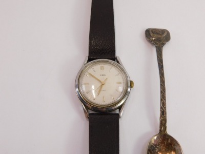 An Ebel gents wristwatch, with Swiss movement in stainless steel case, numbered 9123906 48 6, together with a silver topped and Viking design spoon. (2) - 2