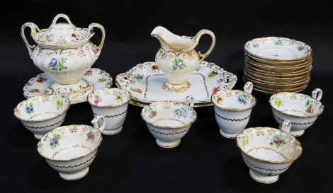 An early 19thC porcelain part tea and coffee service, painted with flowers, gilt heightened, pattern no 8407, comprising two bread plates, cake plate, cream jug, sucrier, five tea cups, two coffee cups, and eleven saucers. (2 trays)