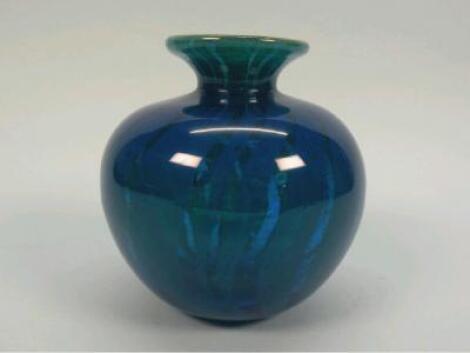 A Mdina glass bottle shaped vase of squat form