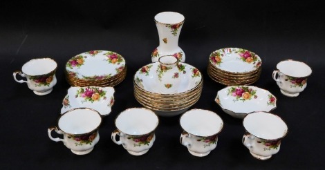 A Royal Albert Old Country Roses porcelain part tea service, comprising six cups and saucers, six bowls, six side plates, two pin dishes and two vases.