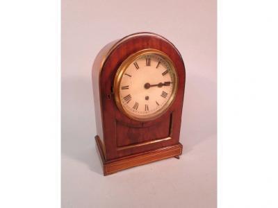 A late 19thC mahogany and brass inlaid timepiece