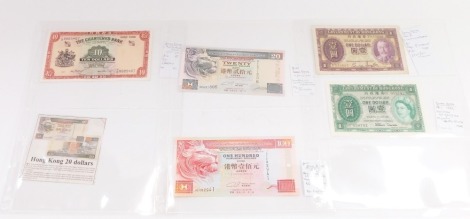 Five bank notes of Hong Kong, comprising Chartered Bank 10 dollars (1962), Government Bank 1 dollar (George V), 1 dollar (1959), HSBC Ltd 20 dollars (1995) and HSBC Ltd 100 dollars (1993).