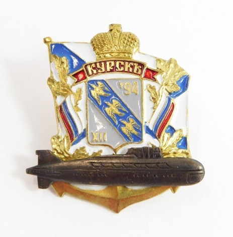 A Kursk Submarine badge, brass, two-level construction. The Kursk submarine sank in August 2000.