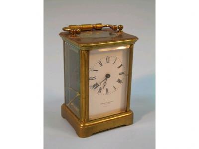 A late 19thC French brass carriage time piece