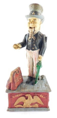 A reproduction Uncle Sam cast iron novelty money box, 29cm high.