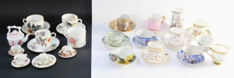A group of early 20thC and later coffee cans and saucers, to include a Royal Doulton birds of paradise coffee can and saucer, a Crown Staffordshire Leeds pottery miniature tankard, Coalport Hong Kong pattern miniature cup and saucer, Wedgwood strawberry p