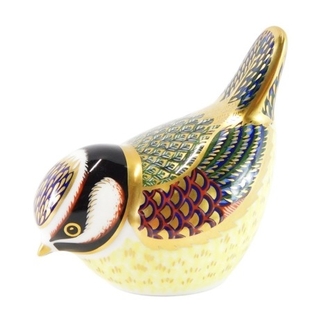 A Royal Crown Derby Imari paperweight of a blue tit, with multicoloured feathers, number MNVI, with a gold coloured stopper, 7cm high.