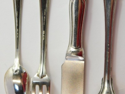 An Italian part table service, comprising a set of table knives and forks, each shell pattern, marked 800., together with a set of pickle forks and spoons, with similar markings, with dust protectors, 33.99oz all in. - 4