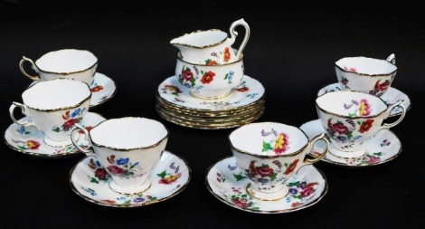 A Royal Albert porcelain part tea service decorated in the Barbara Ann pattern, comprising six cups and saucers, six side plates, milk jug and sugar bowl.