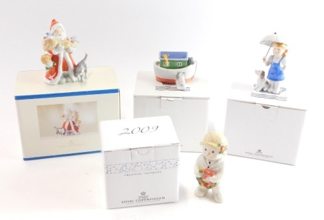 A group of Royal Copenhagen figures, comprising Toy's Mini Collection Noah's Ark, Creating Moments Range No 9006., Mini Collection Girl with Dog, and a Royal Copenhagen 2010 Santa Claus figure, all boxed. (4)