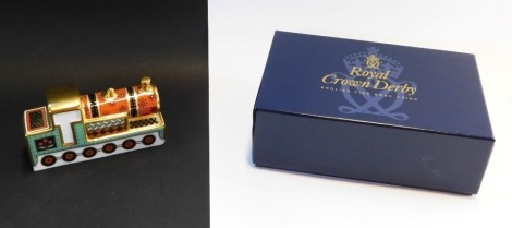 A Royal Crown Derby Treasures of Childhood Steam Train paperweight, for 2002, boxed, 10cm wide.