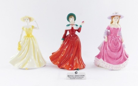 Three Royal Doulton figures, comprising The International Collector's Club Winter's Day HN4589, with Royal Doulton plaque, 16cm high., A Summer Breeze HN4587, 15cm high., and Springtime HN4586, 15cm high, all boxed.