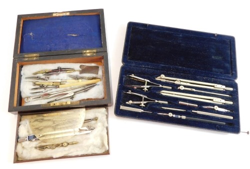 Two compass sets, comprising a composite set in a rosewood box, and a later German set, boxed. (2)