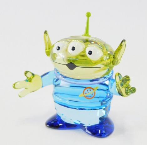 A Swarovski crystal Toy Story Pizza Planet alien, boxed.