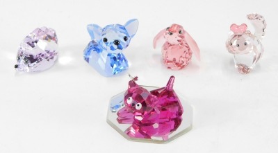 Five Swarovski crystal ornaments, comprising dog, hedgehog, two cats, and a rabbit, each boxed. (5)