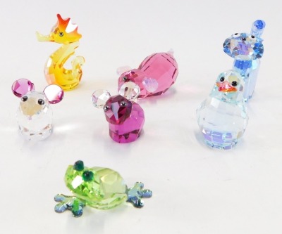 Six Swarovski crystal ornaments, comprising pair of mice, seahorse, cat, dog, oyster clam, and a penguin, boxed. (6)