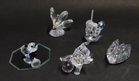 A group of Swarovski crystal ornaments, comprising swan, panda, mouse, cat with ball, and butterfly, all boxed. (5)