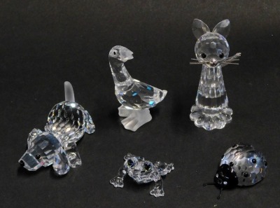 Five Swarovski crystal ornaments, comprising a goose, ladybird, frog, cat, and dog, boxed. (5)