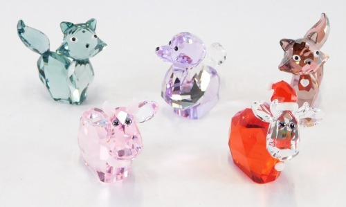 Four Swarovski crystal ornaments, comprising a pair of cats, two moose, and a poodle, boxed. (4)