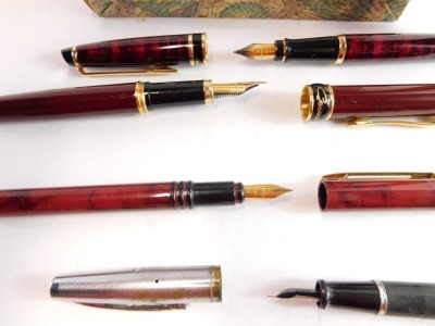 A group of pens, to include a Waterman Harris fountain pen, Waterman biro, a Parker fountain pen, and a Gnum Italian biro, one boxed. (a quantity) - 2